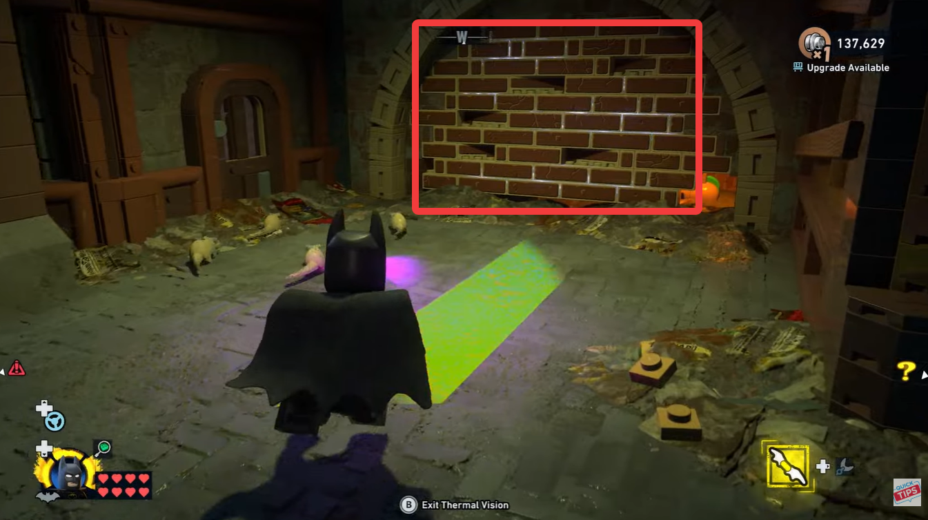 Remove the wall segment to reveal rats in LEGO Batman Legacy of the Dark Knight