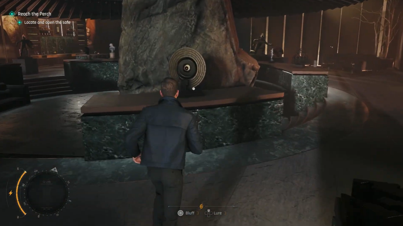 Bond examining the circular tower architecture model clue needed for the penthouse safe combination puzzle in 007 First Light.