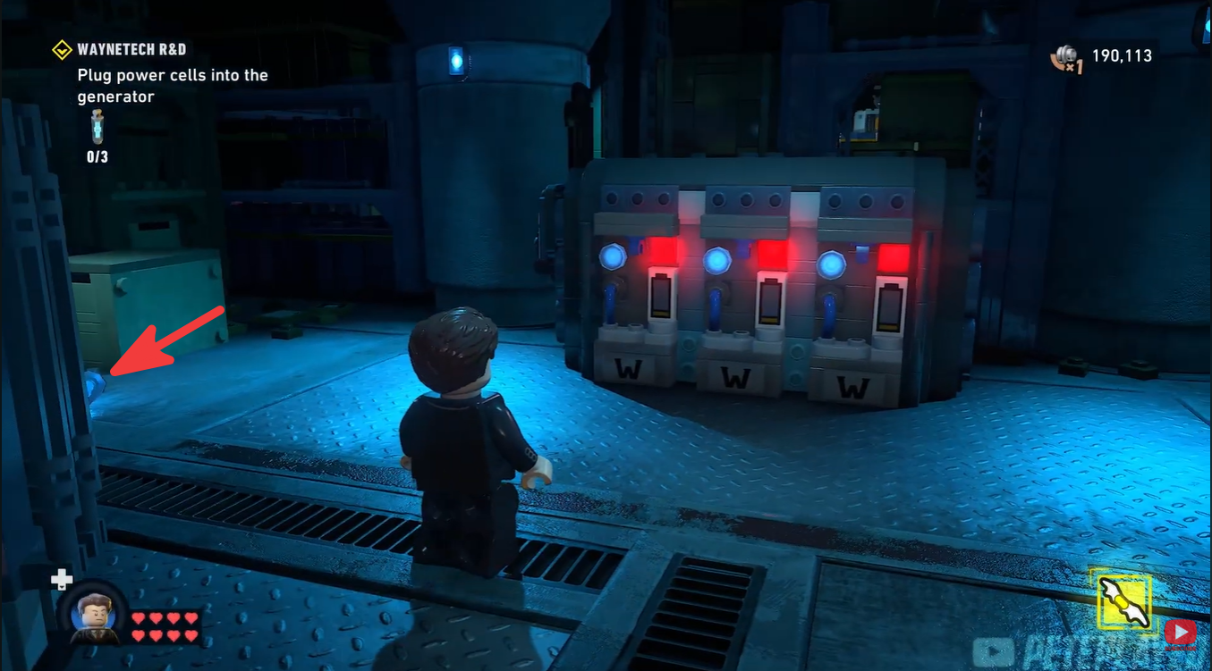 Batman standing beside the first Power Cell near the WayneTech R&D generator in LEGO Batman Legacy of the Dark Knight.