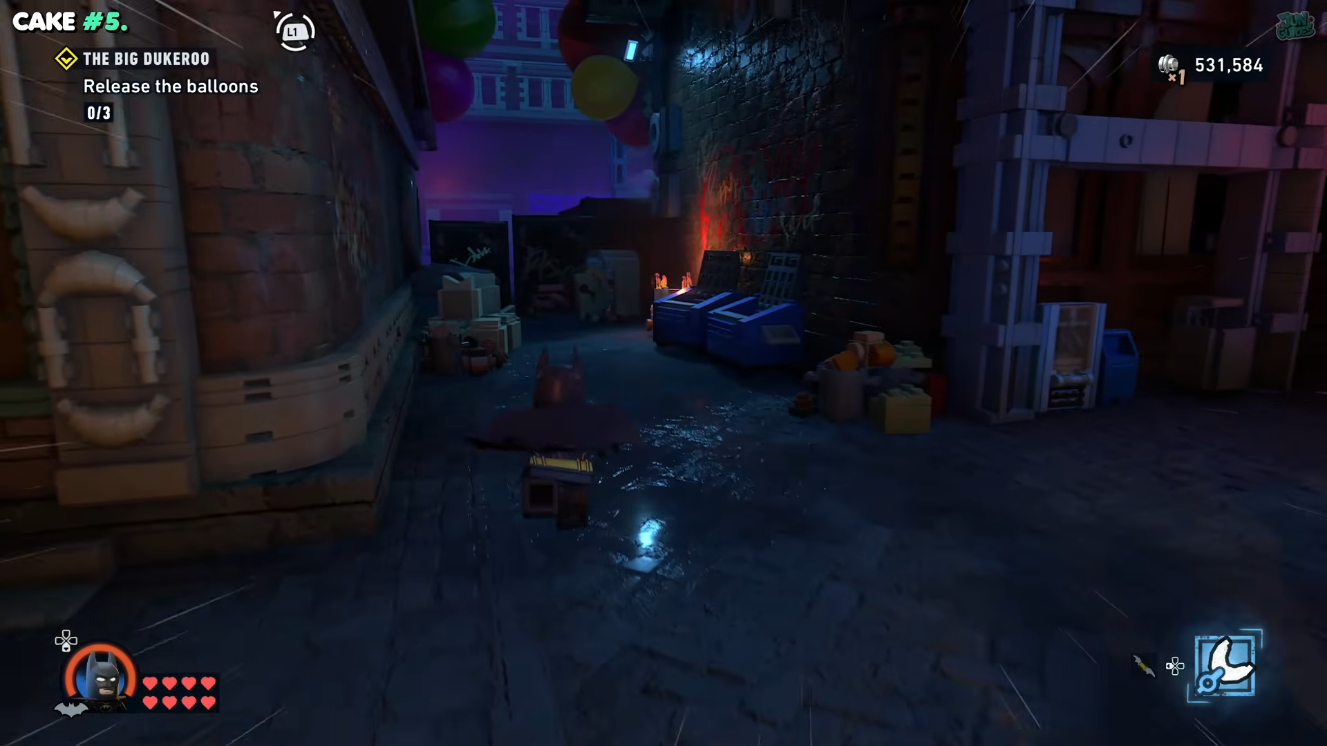 Batman entering a side alley past the third balloon in the Big Dukeroo in Lego Batman: Legacy of the Dark Knight