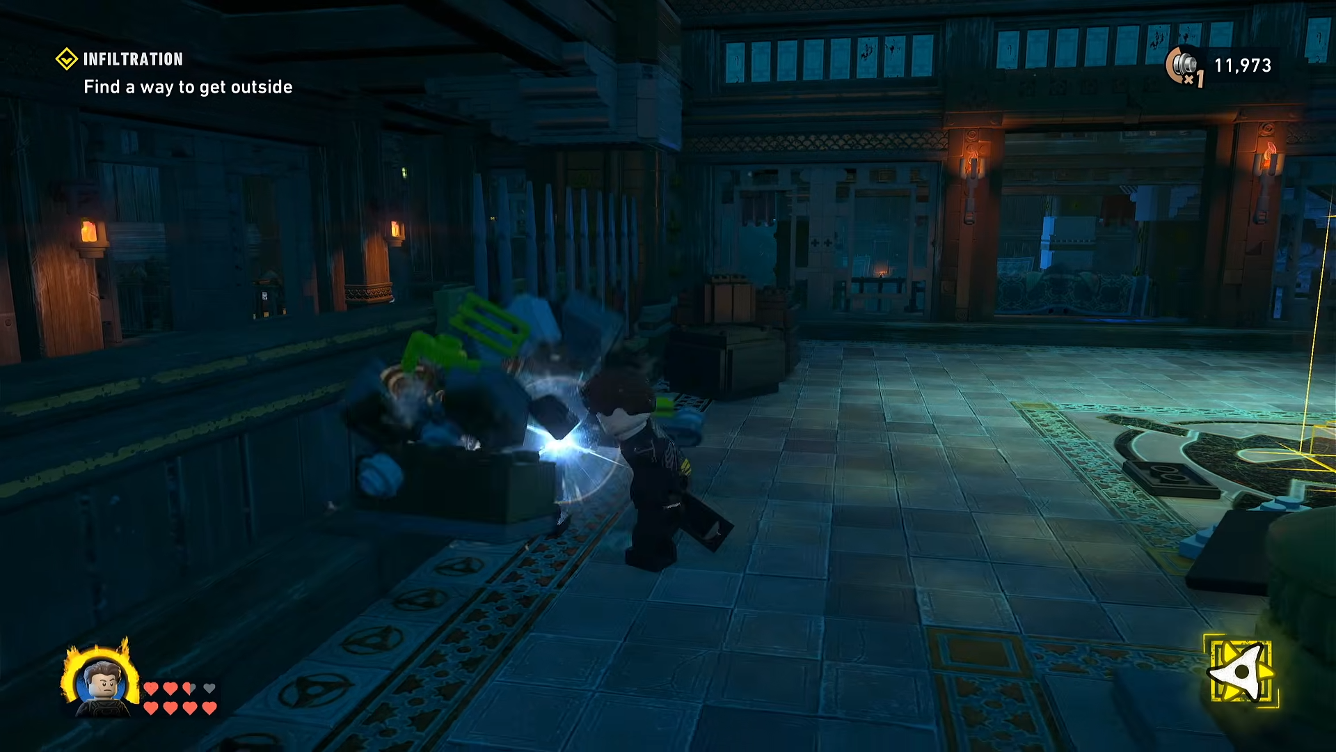 Lego pieces being destroyed by character in LEGO Batman: Legacy of the Dark Knight