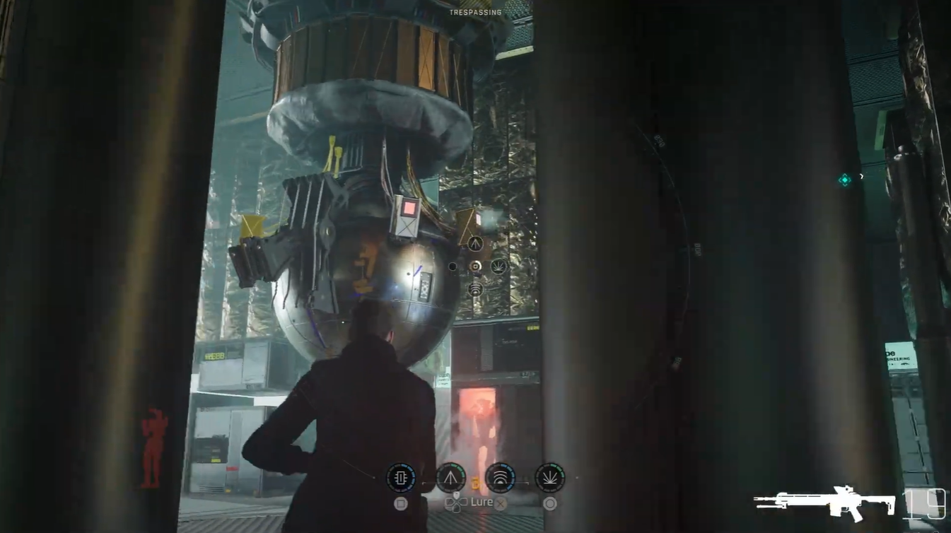 The metallic sphere becomes partially detached after several docking mechanisms have been disabled, allowing progress toward freeing and controlling the device.