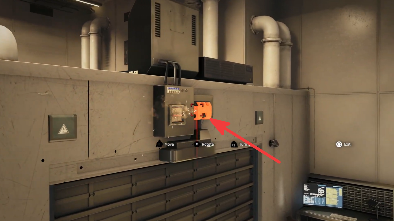 Close-up of the orange electrical connector being rotated and powered inside the lockdown control panel to restore access to the chamber door.