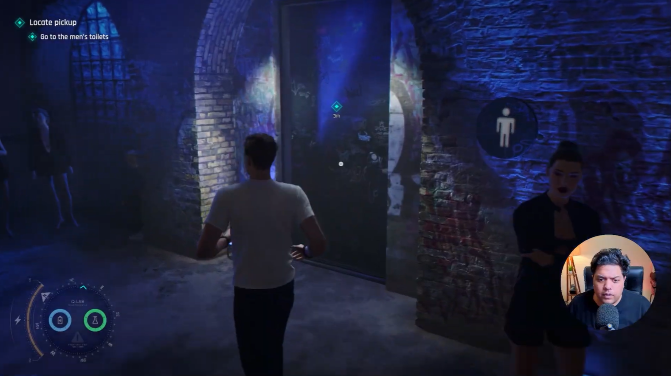 The objective marker leads Bond to the men's toilets area inside the nightclub, where the pickup item is hidden and waiting to be collected.