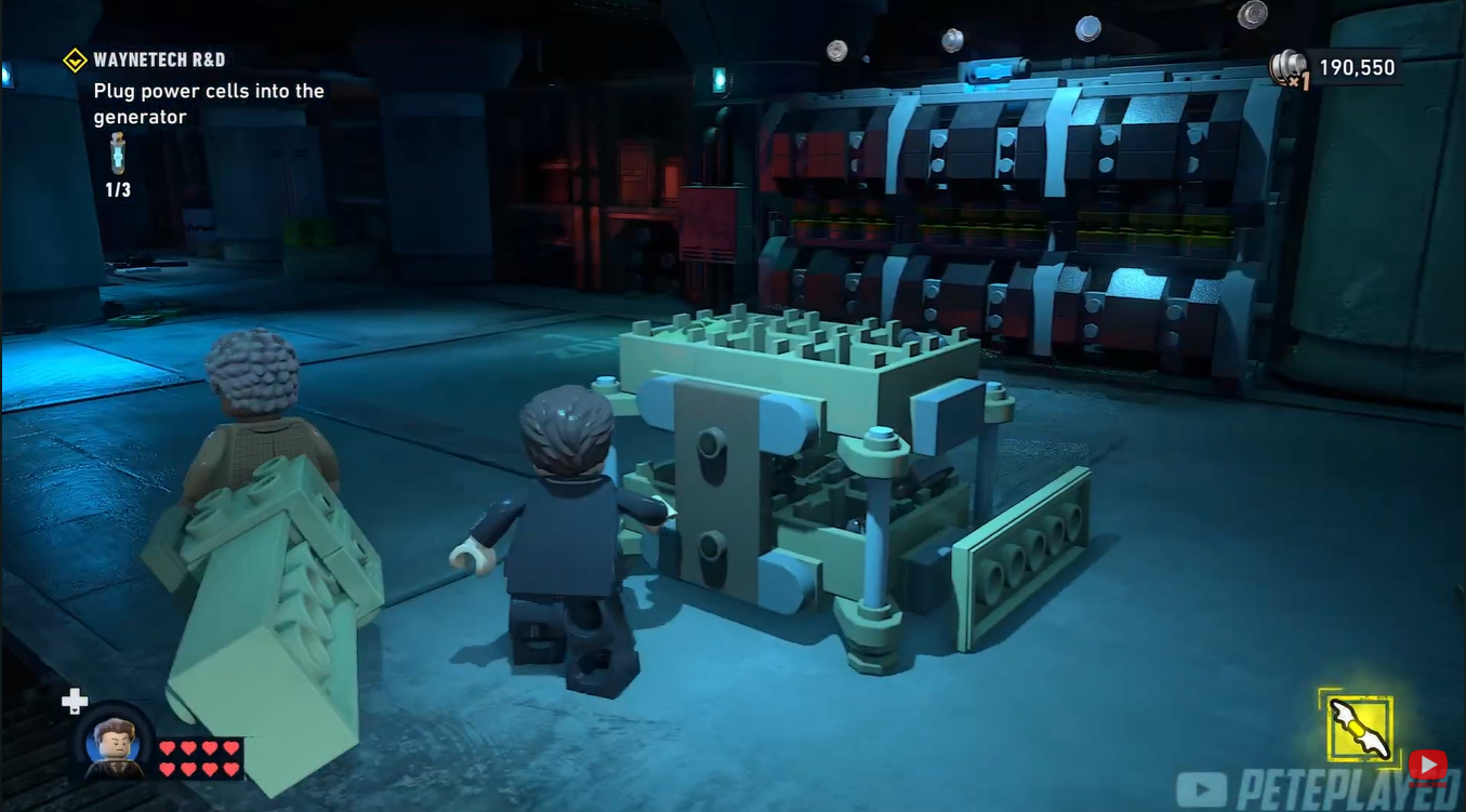 Batman pushing the movable cart beneath the elevated platform containing the second Power Cell in LEGO Batman: Legacy of the Dark Knight
