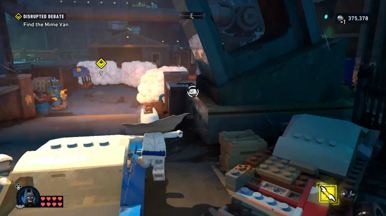Batman collecting hidden cannon parts from debris piles during the Disrupted Debate mission