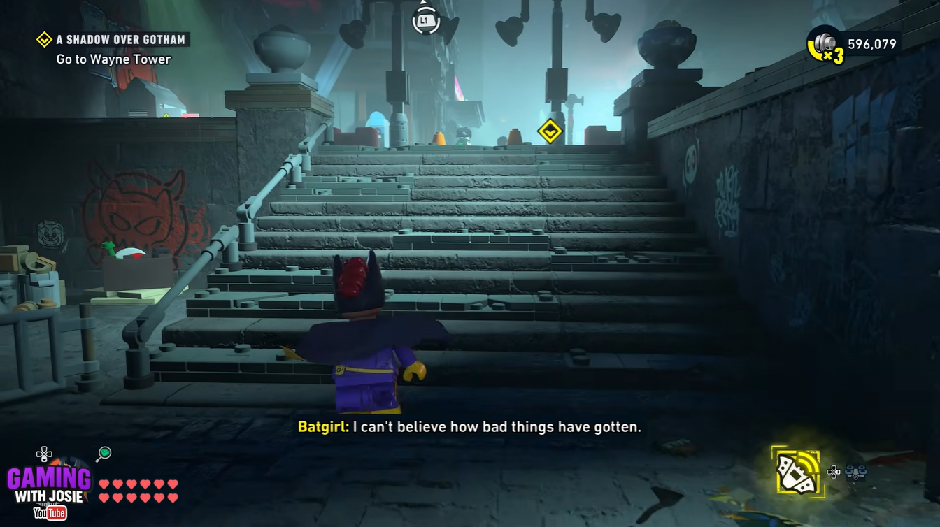 Batgirl defeating the first enemy before reaching the staircase hack terminal