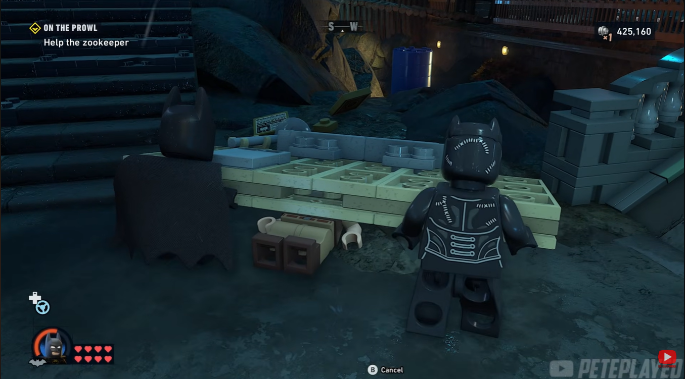Chapter 2 On the Prowl mission objective screen required for unlocking zoo animal side activities in LEGO Batman Legacy of the Dark Knight