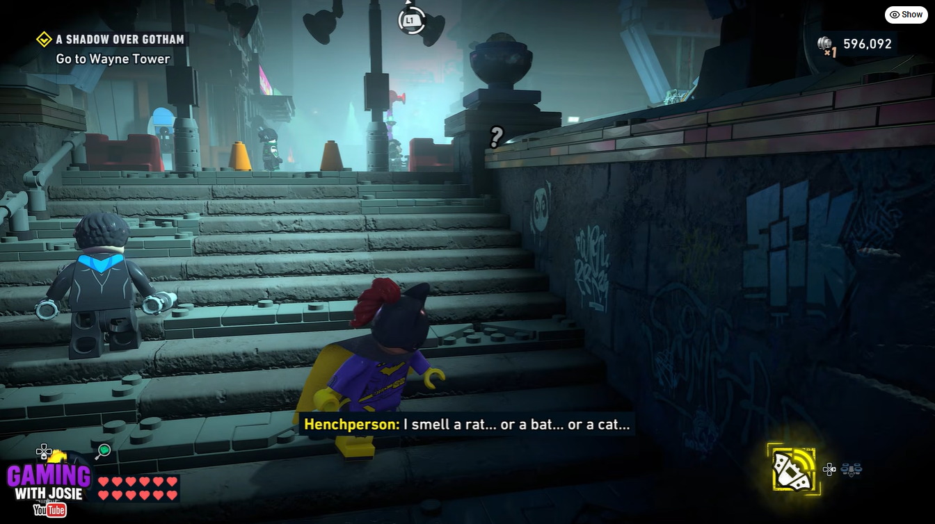 Batgirl hiding near the stairs while waiting to repeat the Quick Hack distraction method