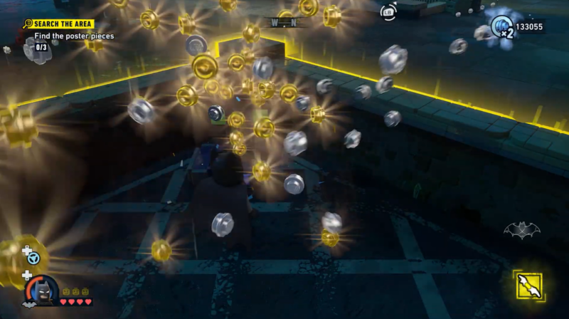 Image showing batman collecting Studs from Batcave Stud Cache in LEGO Batman Legacy of the Dark Knight