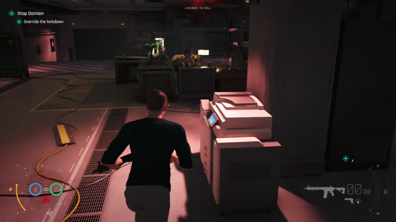 Bond activates a laptop terminal as an intruder alert triggers a facility-wide lockdown during the Stop Damien mission.