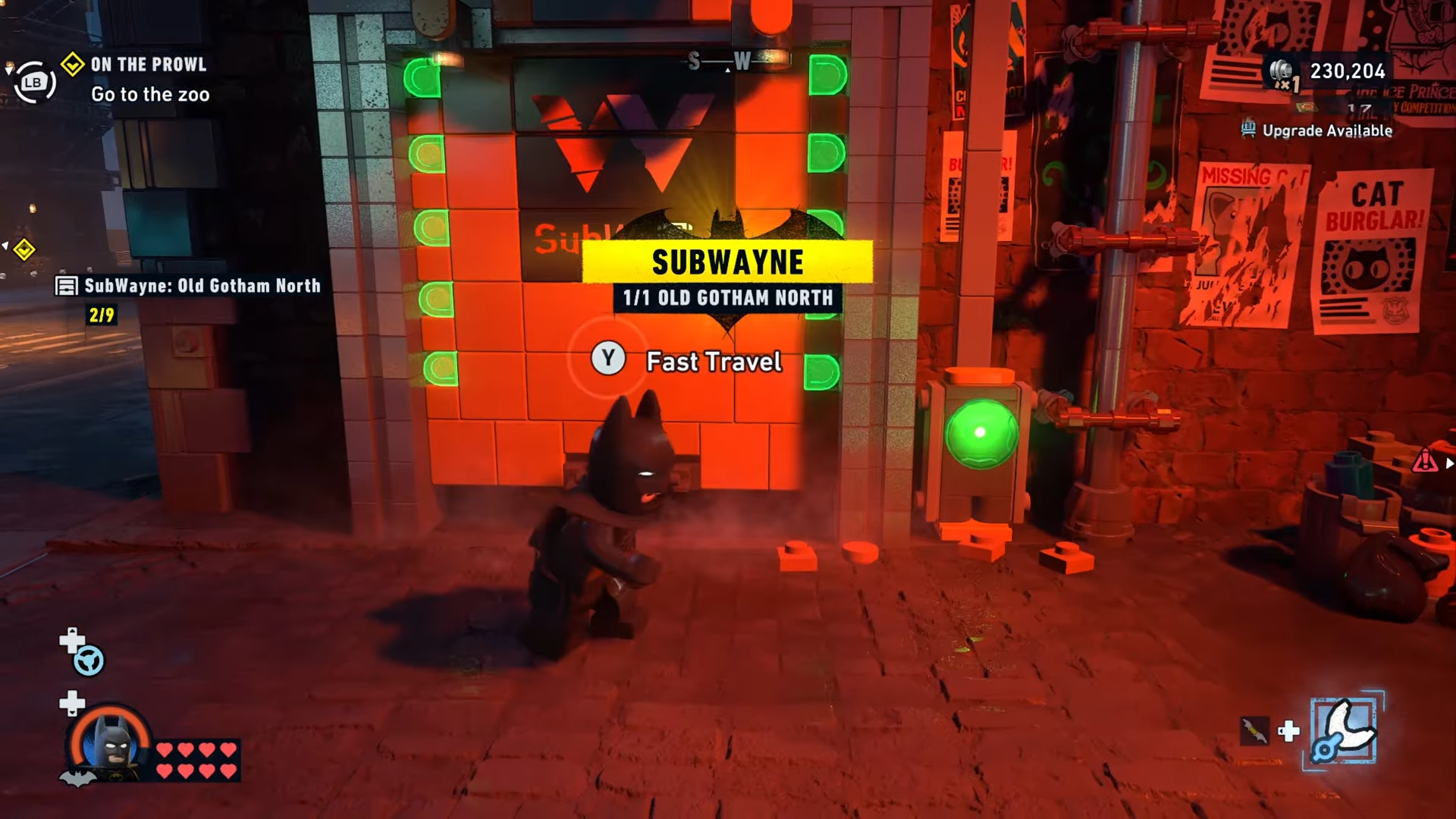 Batman standing in front of the now open Subwayne tunnel system at Old Gotham North in Lego Batman: Legacy Of The Dark Knight: