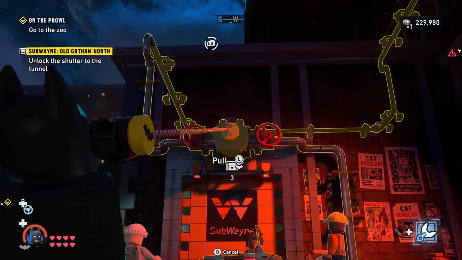 Batman using his gun to pull the pipe open on top of the partying civilians at Old Gotham North in Lego Batman: Legacy Of The Dark Knight: