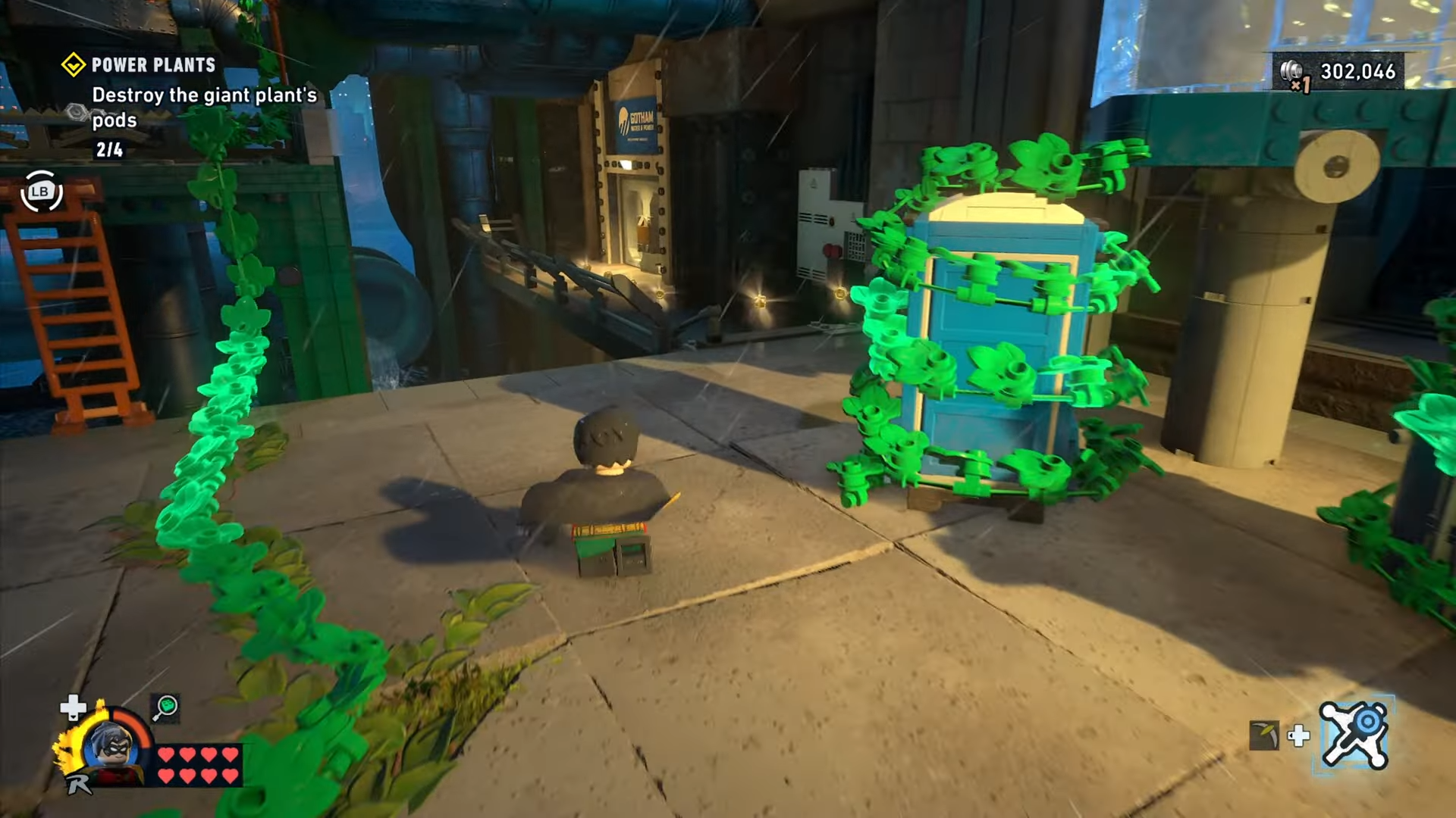 Robin moving past the outdoor generator area in Power Plants mission in Lego Batman: Legacy of the Dark Knight.