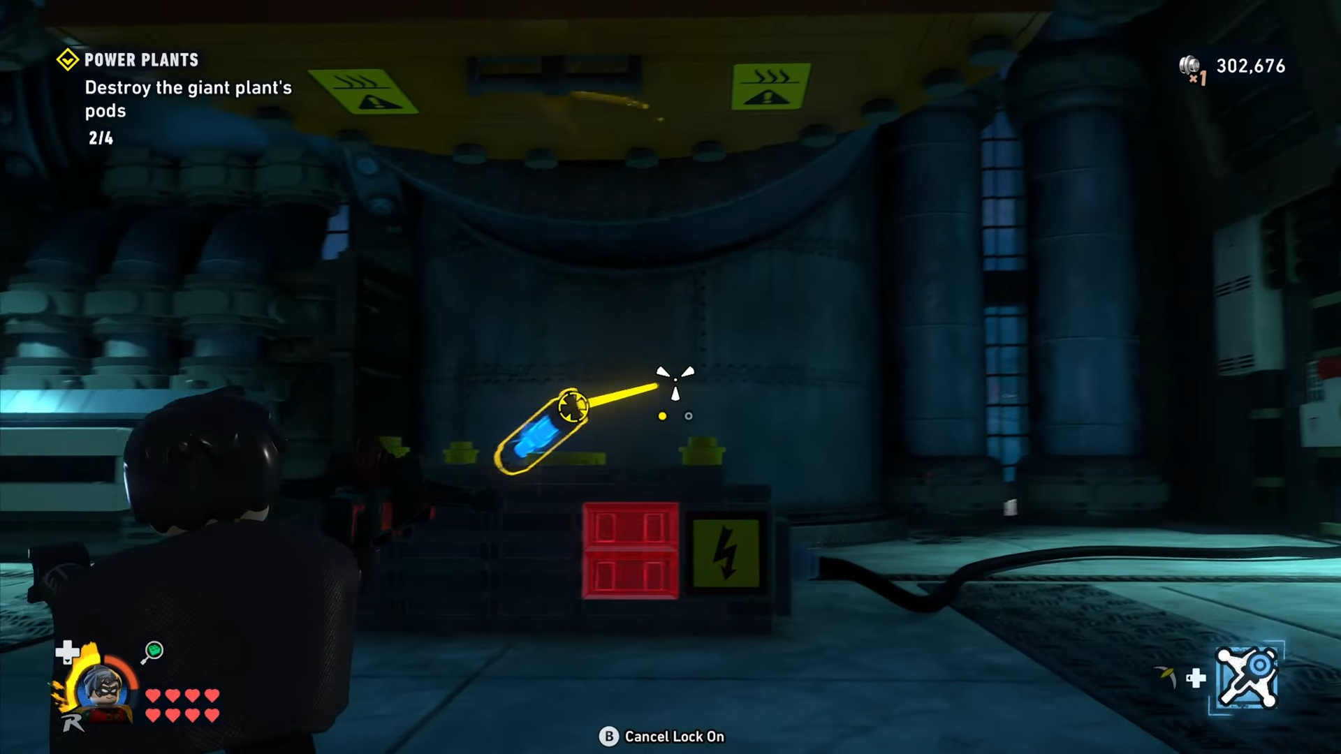 Robin hooks the blue cell inside the room in Power Plants mission in Lego Batman: Legacy of the Dark Knight.