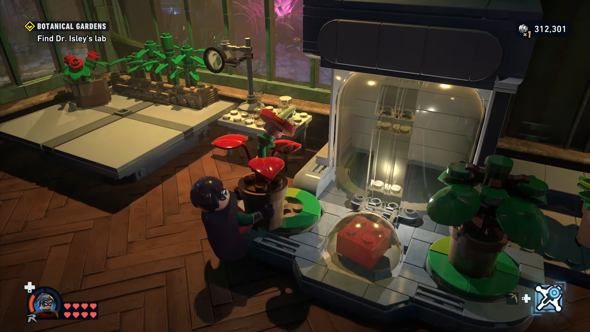 Robin placing the red plant to the left of the red brick mechanism in Botanical Gardens in Lego Batman: Legacy of the Dark Knight.