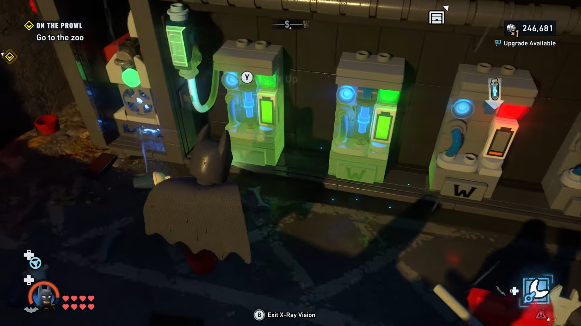Batman picks up the leftmost battery from the machine that opens the tunnel to Subwayne Old Gotham South in Lego Batman Legacy of the Dark Knight.