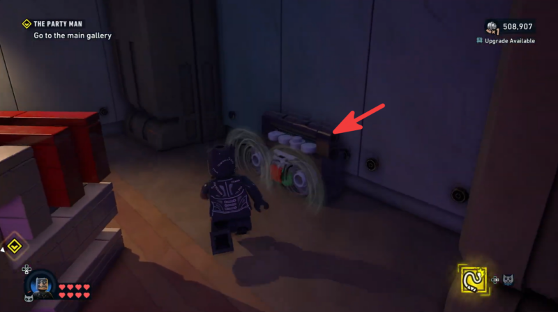 Batman collecting the first hidden boombox behind the spawn location in the Party Man mission.