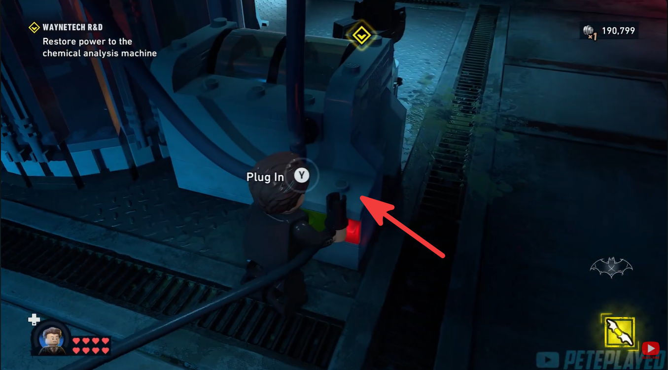 Generator connected to the WayneTech power source with energy flowing through the lab in LEGO Batman: Legacy of the Dark Knight