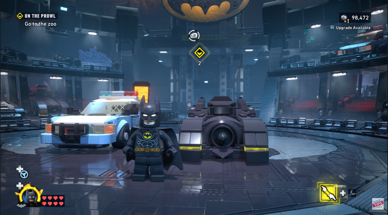 Batman standing inside the Batcave hub in LEGO Batman Legacy of the Dark Knight