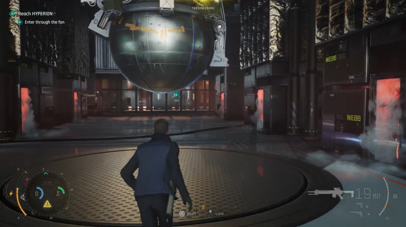 The large metallic sphere hangs above the center platform in the Hyperion facility, serving as the key environmental puzzle object used to destroy androids and break obstacles.