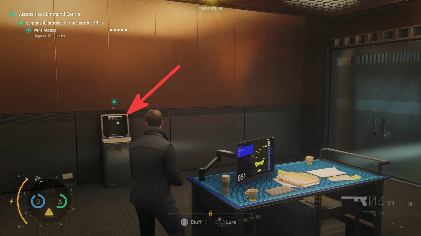 James Bond standing beside the Security Office terminal used to upgrade the ID bracelet in 007 First Light