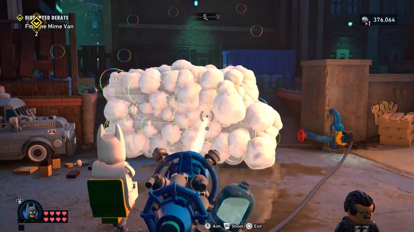 Batman approaching the suspicious Mime Van after completing the street-cleaning objective - LEGO Batman Legacy of the Dark Knight