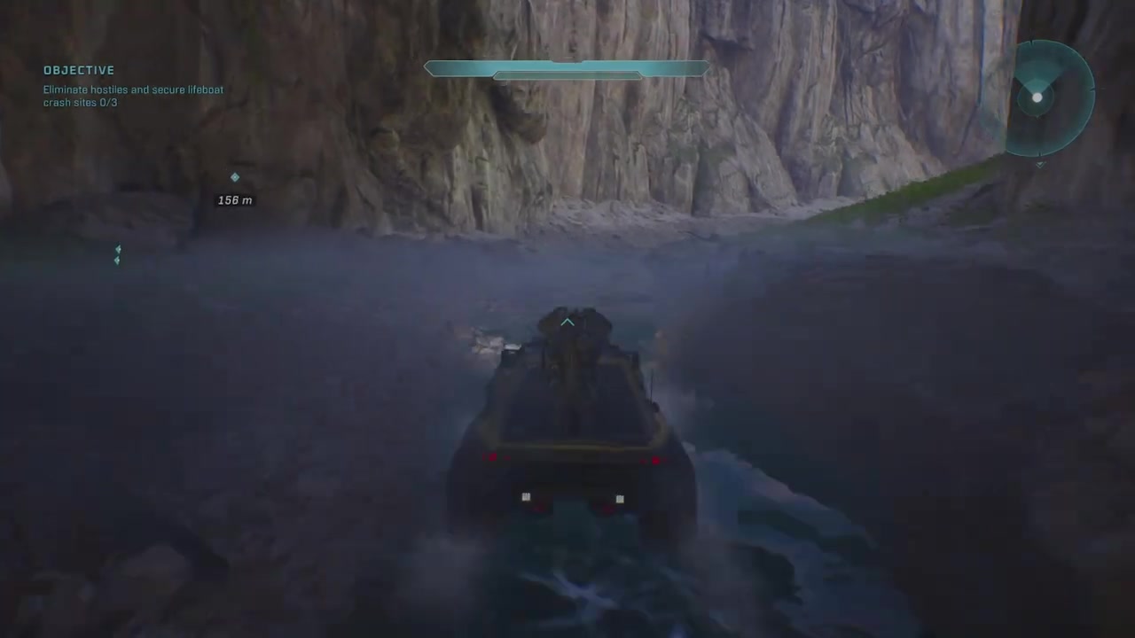 Spartan lines up a grenade jump near rocky ledges.