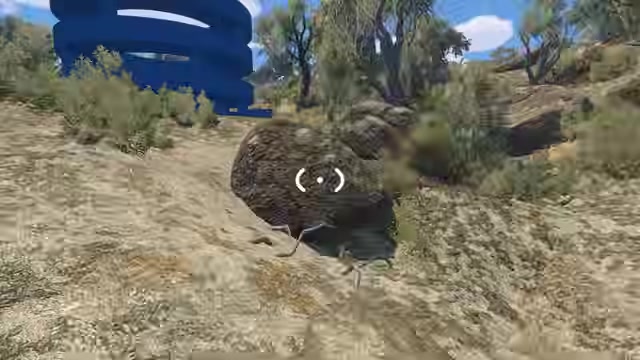 Enter the large blue circular building