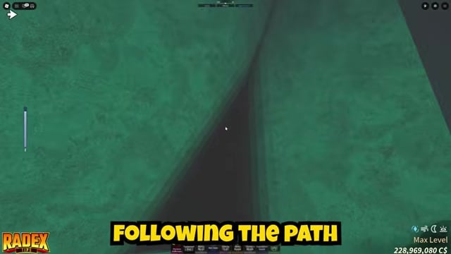 Go through the small arch passage