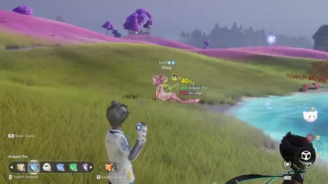 Find the pink Glacy beside the water