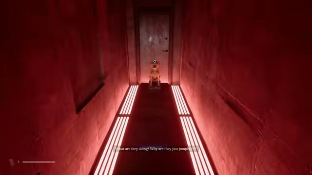 The final Guide Dogs statue stands directly in front of a doorway at the end of the red-lit passage.