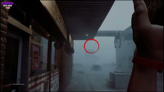 Align the reticle with the statue