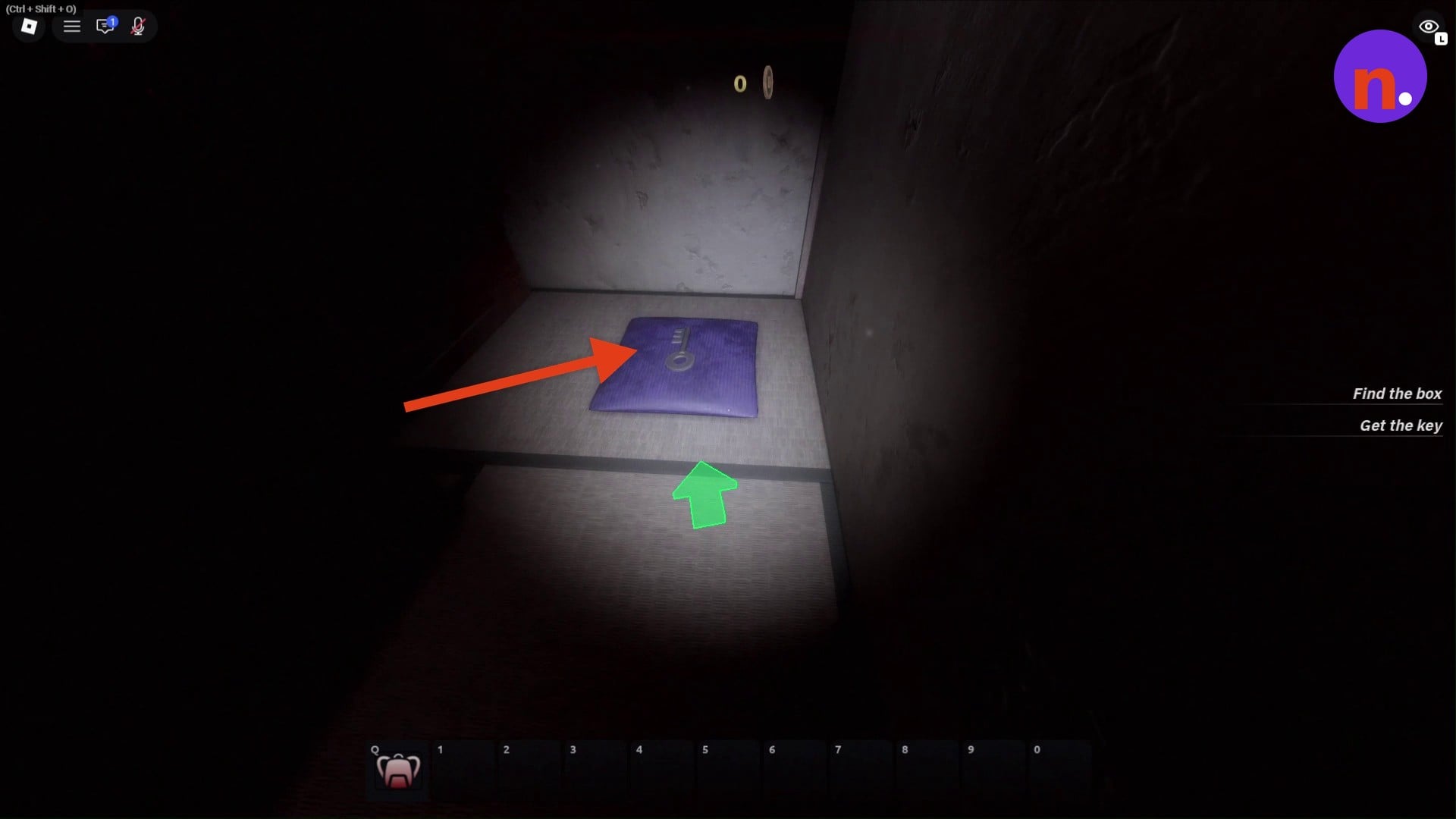 The silver key rests on a purple cushion
