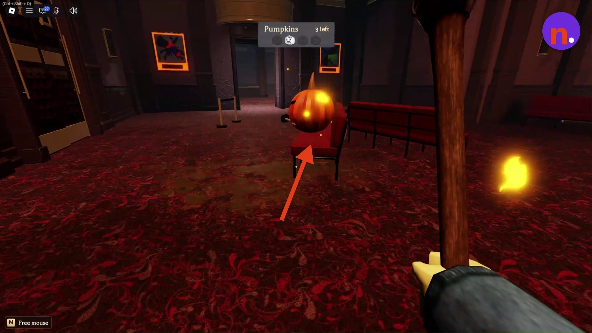 Find the pumpkin above the red seating