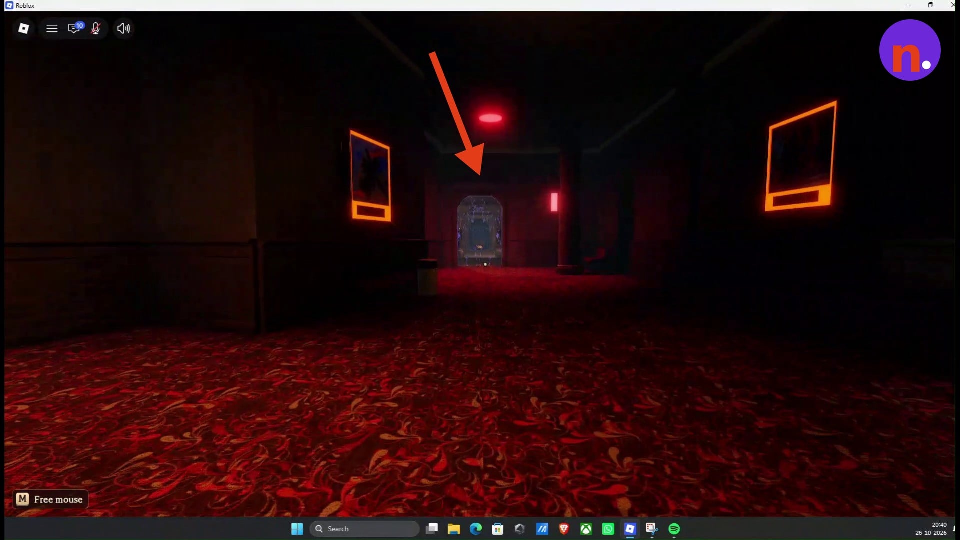The glowing portal doorway marked by the red arrow