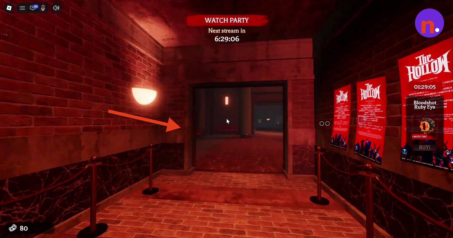 The theater entrance through the red-lit hallway