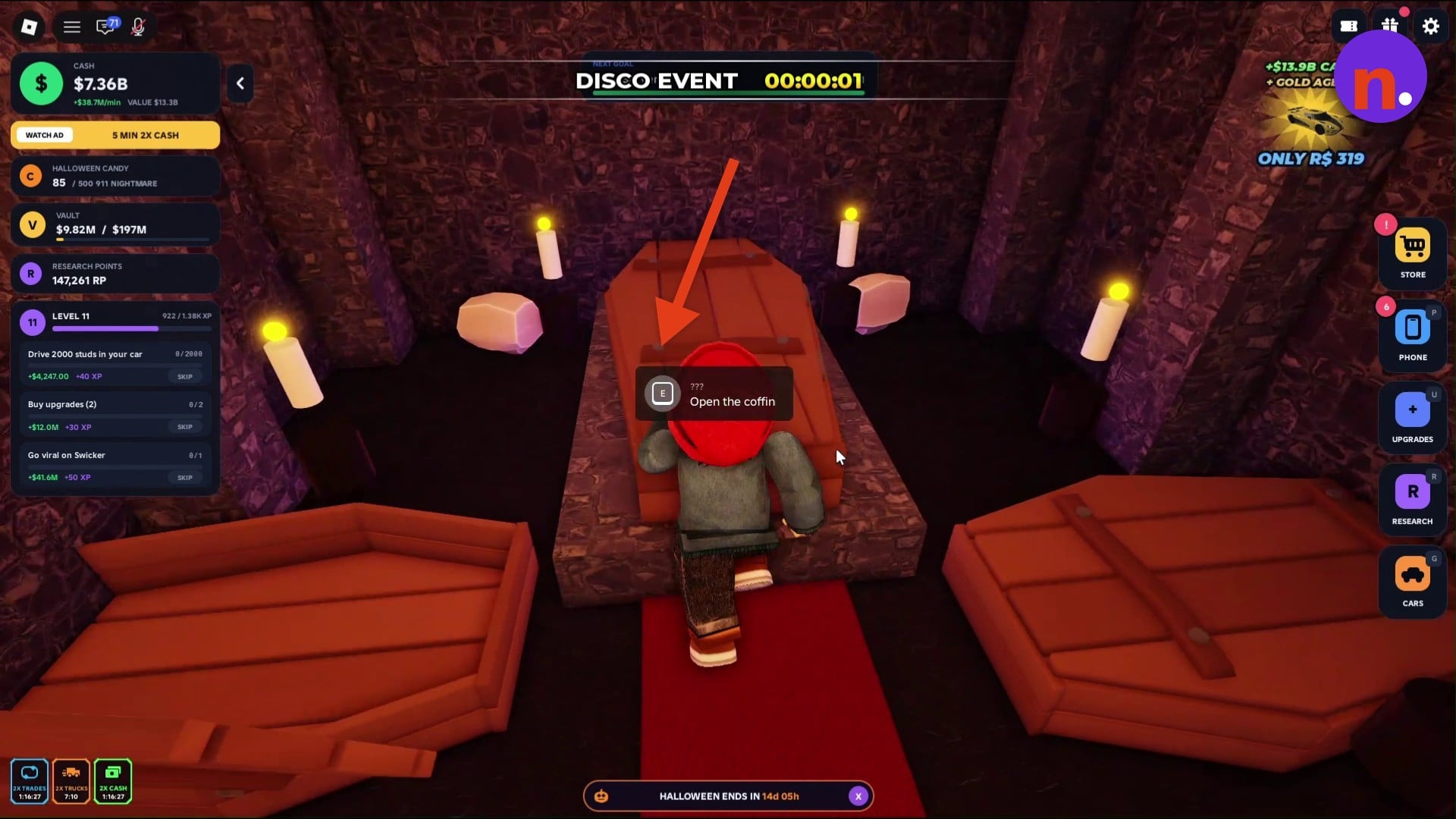 The raised wooden coffin surrounded by candles