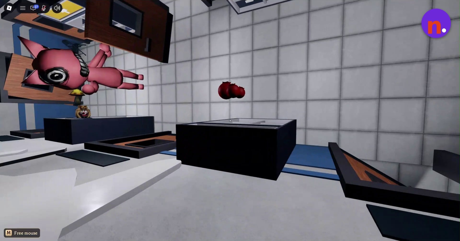 Locate the red cherries floating above the examination bed